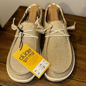 Women’s Hey Dudes Sz 7. Gold Glitter Wendy’s. Never worn.